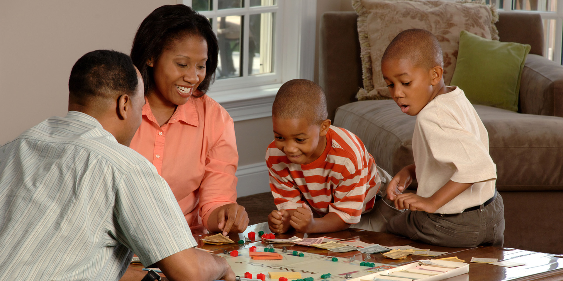 family playing a board game